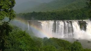 Athirappilly waterfalls with rainbow